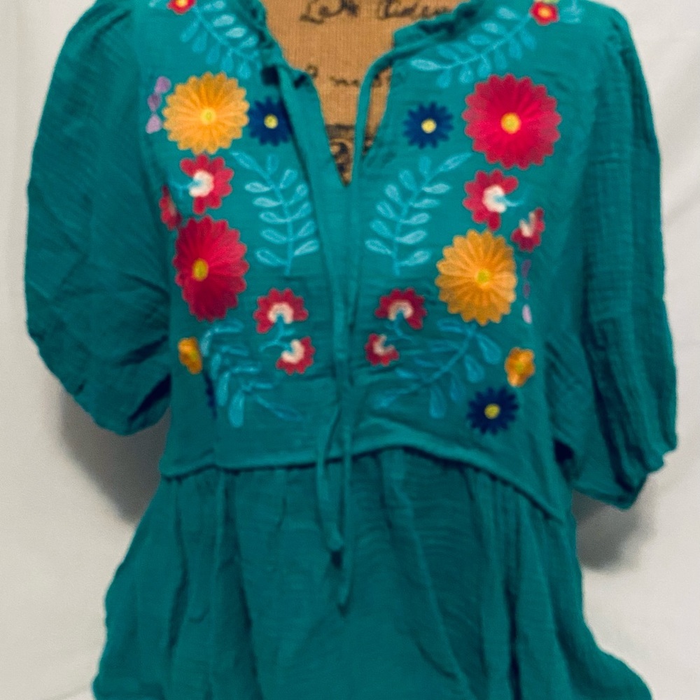 Umber Floral embroidery baby doll silhouette top. Drawstring detail size medium